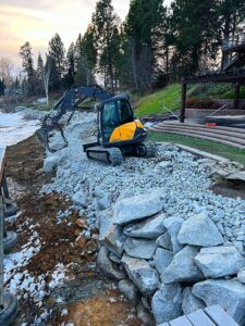 bulldozer prepping backyard multilevel area