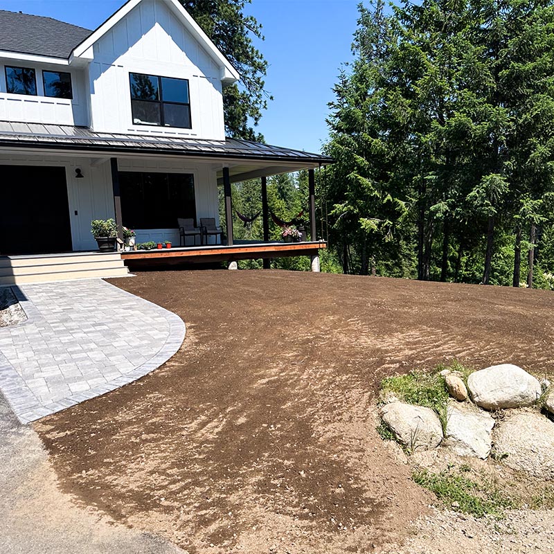 front yard area with ground prepped for lawn installation